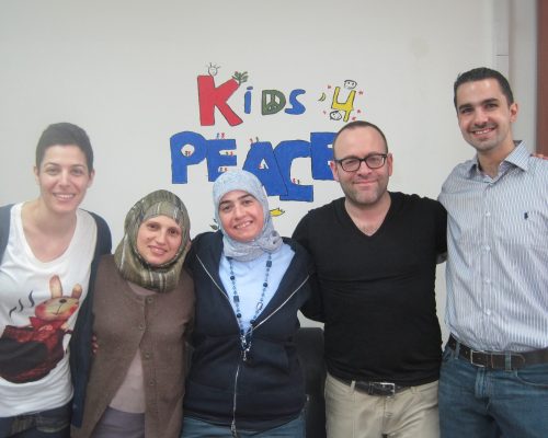 yakir englander with arabics in kids 4 peace